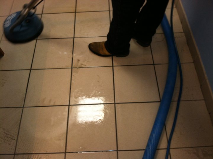 Impact Commercial Cleaning Services, LLC janitor mopping floor